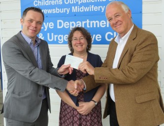 Picture of Andrew Evans receiving a cheque for £5000 from Clare Humphreys and Robin Durham of Sight Loss Shropshire