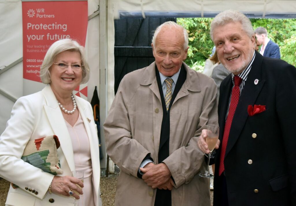 Sir Algernon Heber-Percy of Hodnet Hall (centre) with guests Anna Sutton and Howard Franklin