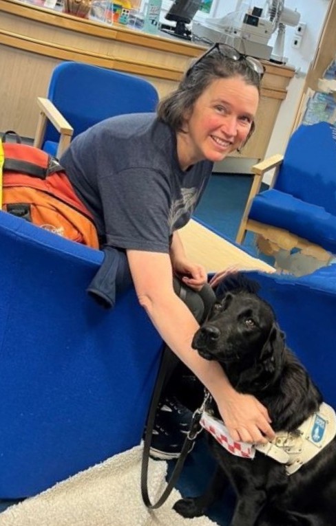 Volunteer – Lottie Lottie, a Sight Loss Shropshire volunteer, with her guide dog.