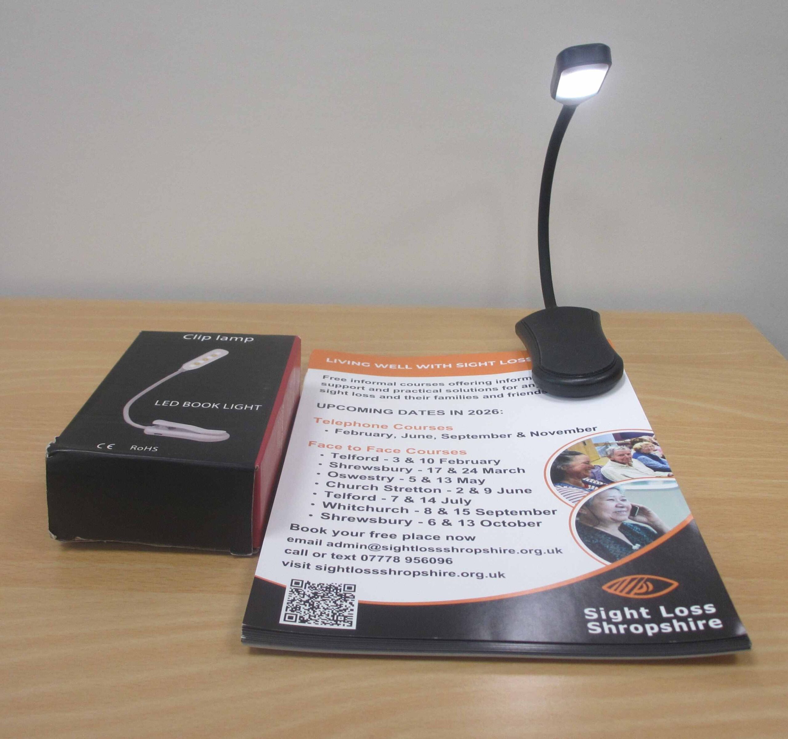 LED light rechargeable clips onto book or similar