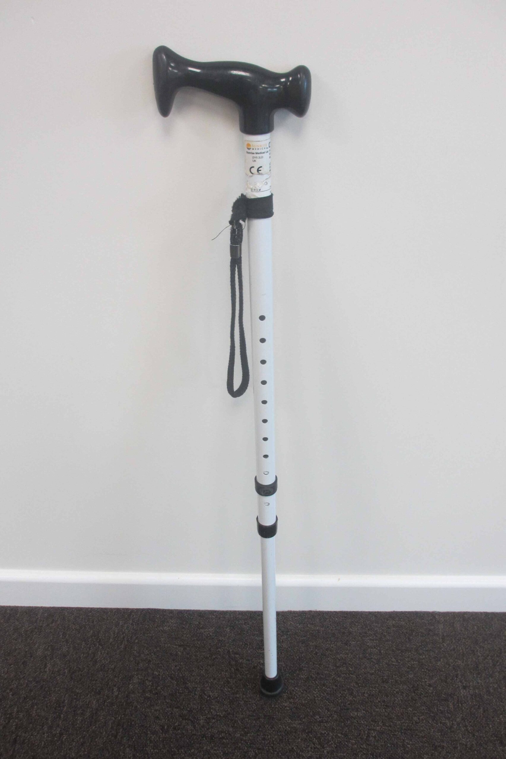 White walking stick with escort handle