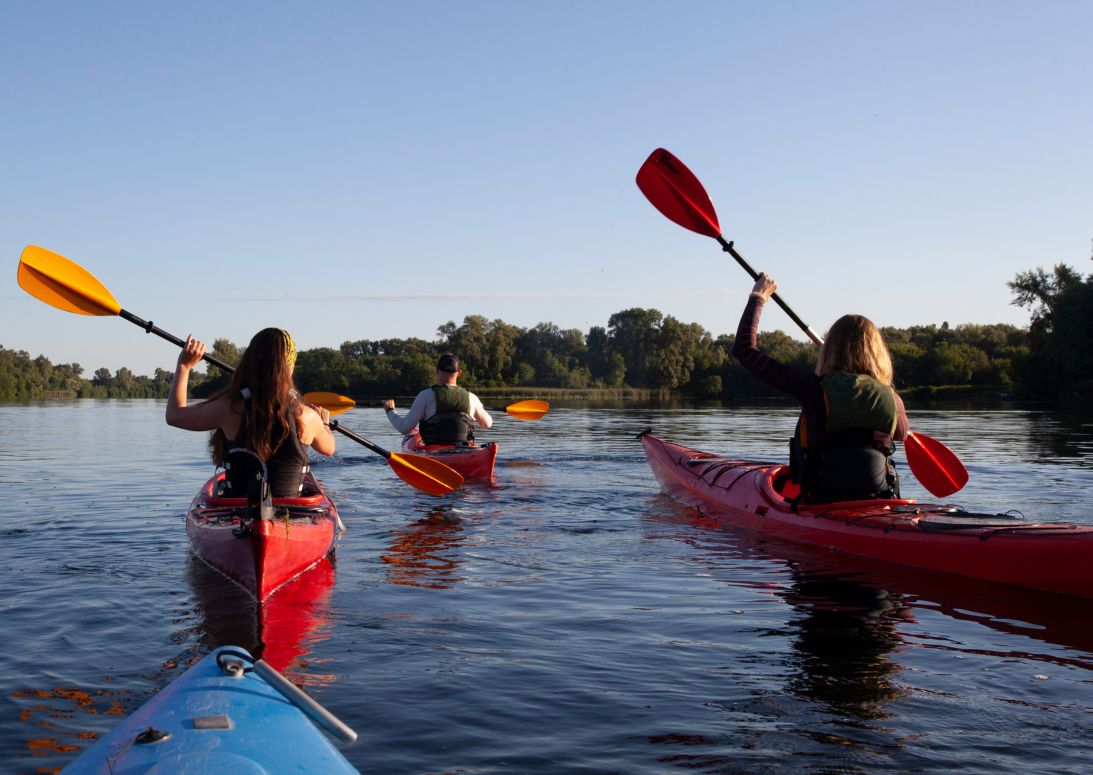 Young people enjoying a kayaking activity