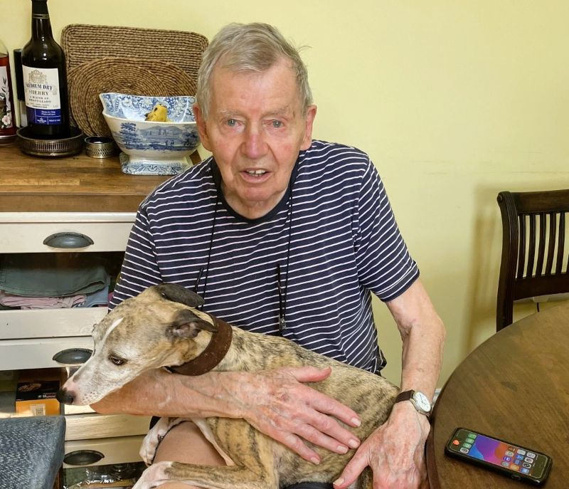 Digital Skills client Michael at home with his dog