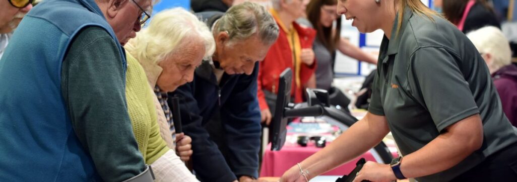 Exhibitors talking to visitors