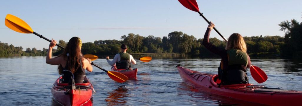 Young people enjoying a kayaking activity