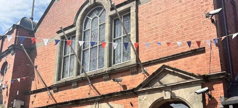 Wem Town Hall, a red brick Victorian building